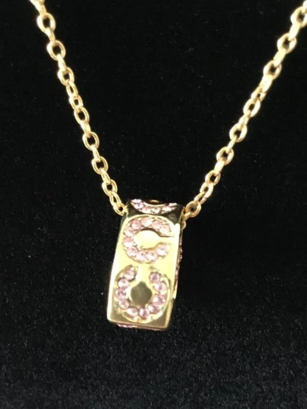 Coach Gold-tone Heart Pendant Necklace with Pink Crystals
